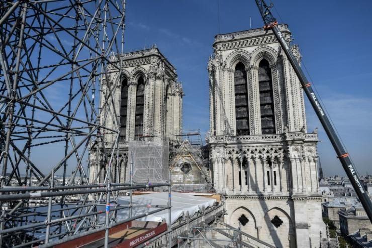 Des échaffaudages sur la façade de Notre-Dame de Paris, le 17 juillet 2019  © POOL/AFP/Archives STEPHANE DE SAKUTIN