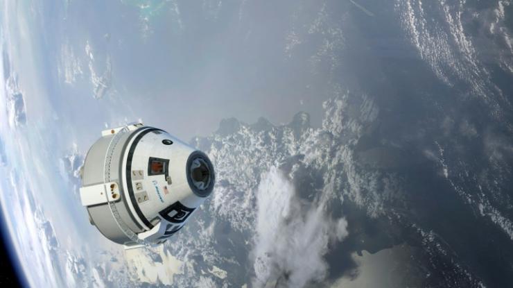 La capsule Starliner de Boeing était censée transporter des astronautes de la Nasa dès 2020, mais va devoir réaliser un nouveau vol d'essai dans l'espace pour vérifier sa fiabilité © NASA/BOEING/AFP HO