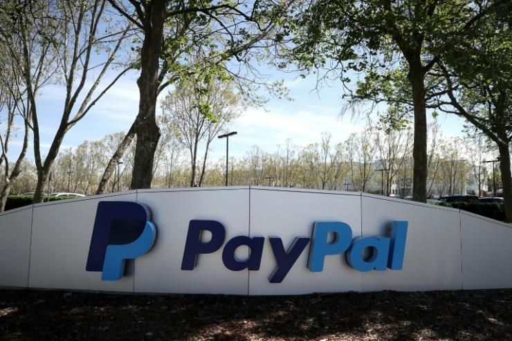 Le géant américain du paiement en ligne PayPal a annoncé qu'il allait autoriser pour la première fois ses utilisateurs au Royaume-Uni à acheter, détenir et vendre des cryptomonnaies via la plateforme de paiement © GETTY IMAGES NORTH AMERICA/AFP/Archives JUSTIN SULLIVAN